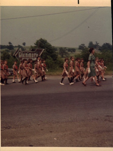 Brownies marching in 75th Anniversary of Chester's Walton Hose Fire Co. Parade, June, 1968. At intersection of Brookside Ave and West St. Note Glenmere Sign. chs-003769